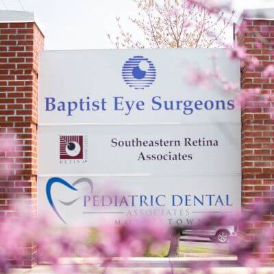 Outside sign for Baptist Eye Surgeons where you'll find your new 